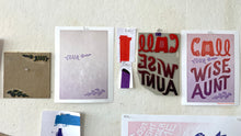 Load image into Gallery viewer, The Call Your Wise Aunt foam blocks, print-in-progress with only "Your", and the final print.