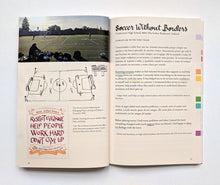Load image into Gallery viewer, a spread featuring Soccer Without Borders, with a photo of a soccer pitch, a drawing of a play, and a certificate of belonging